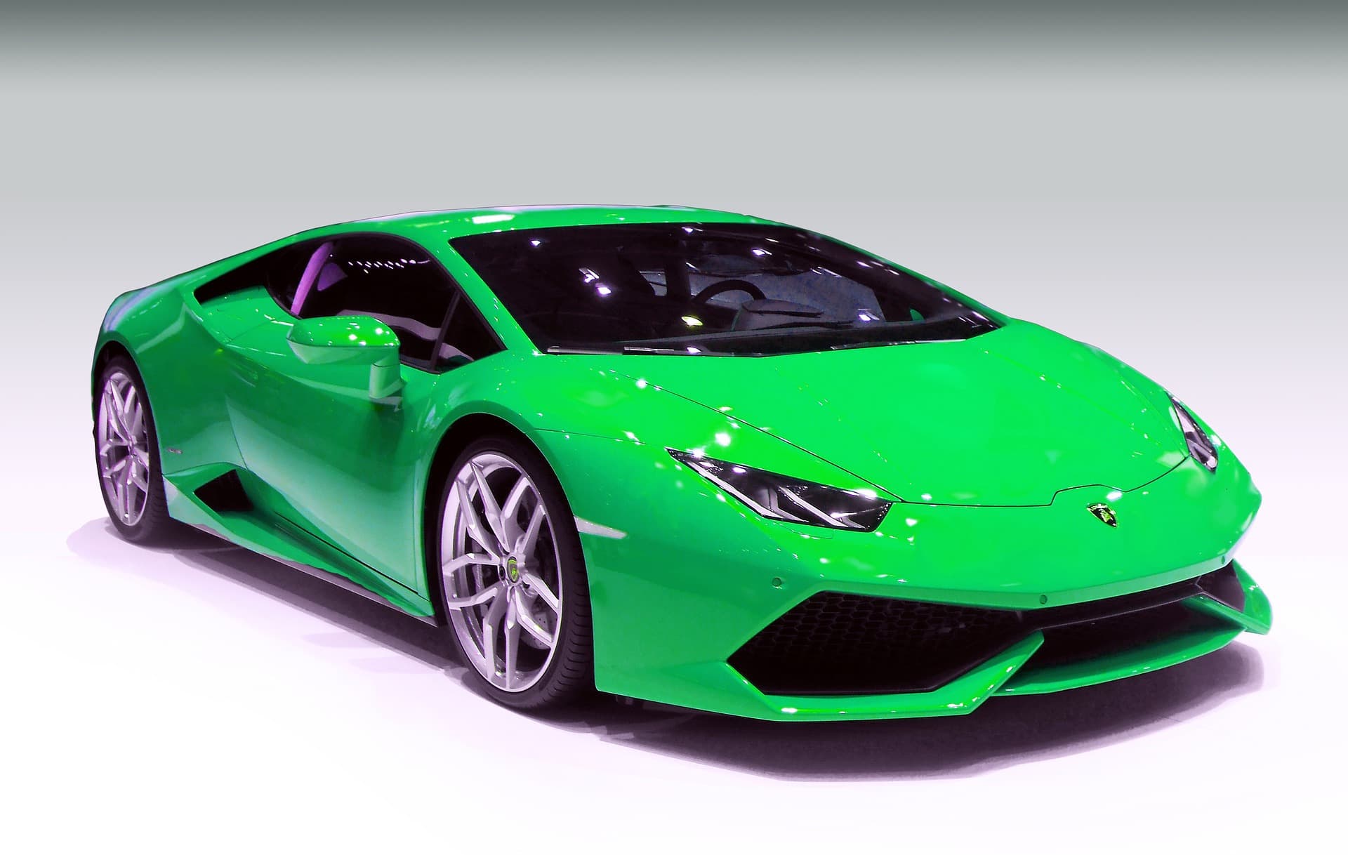 Green luxury sports car on display